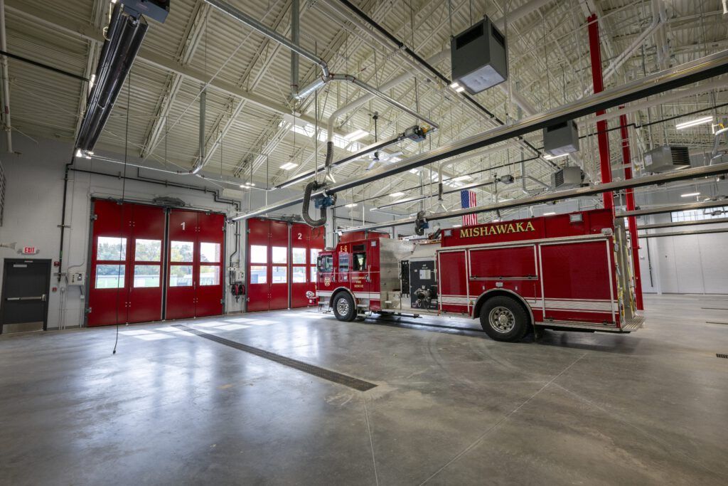 Firetruck in vehicle bay.