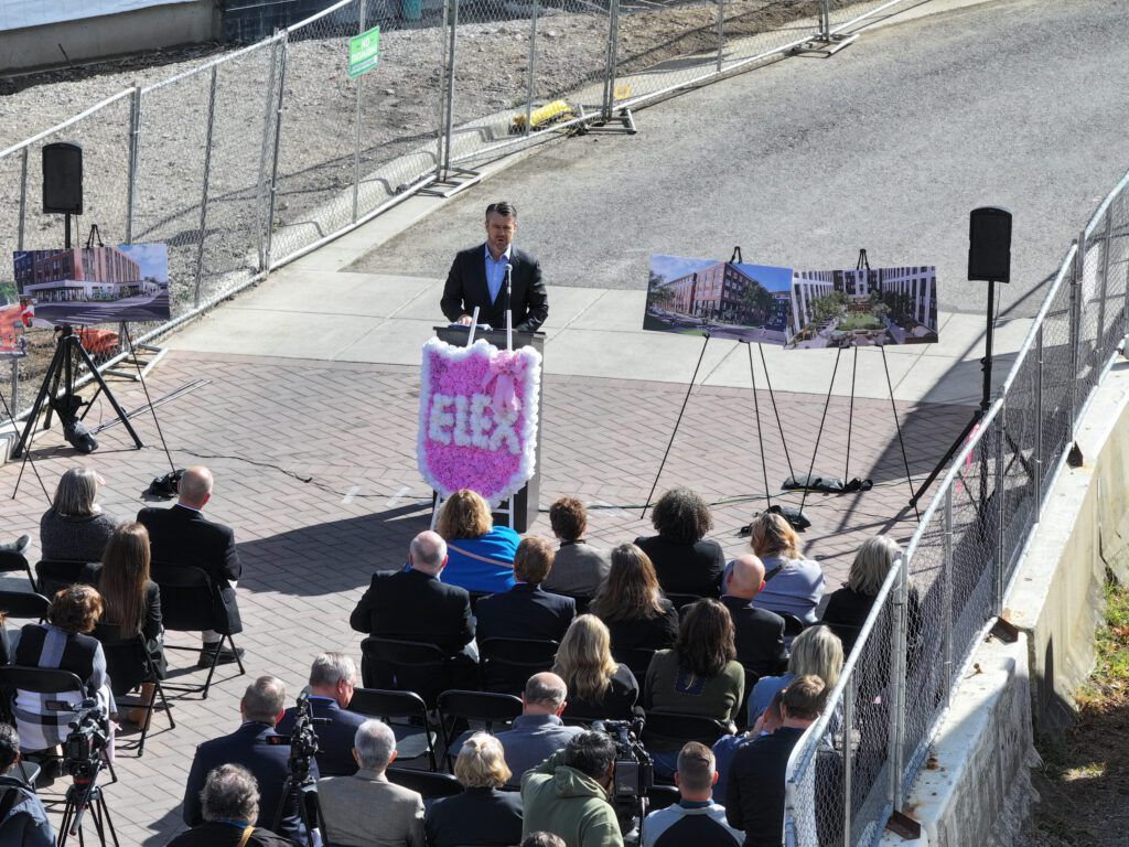 Speaking during event.