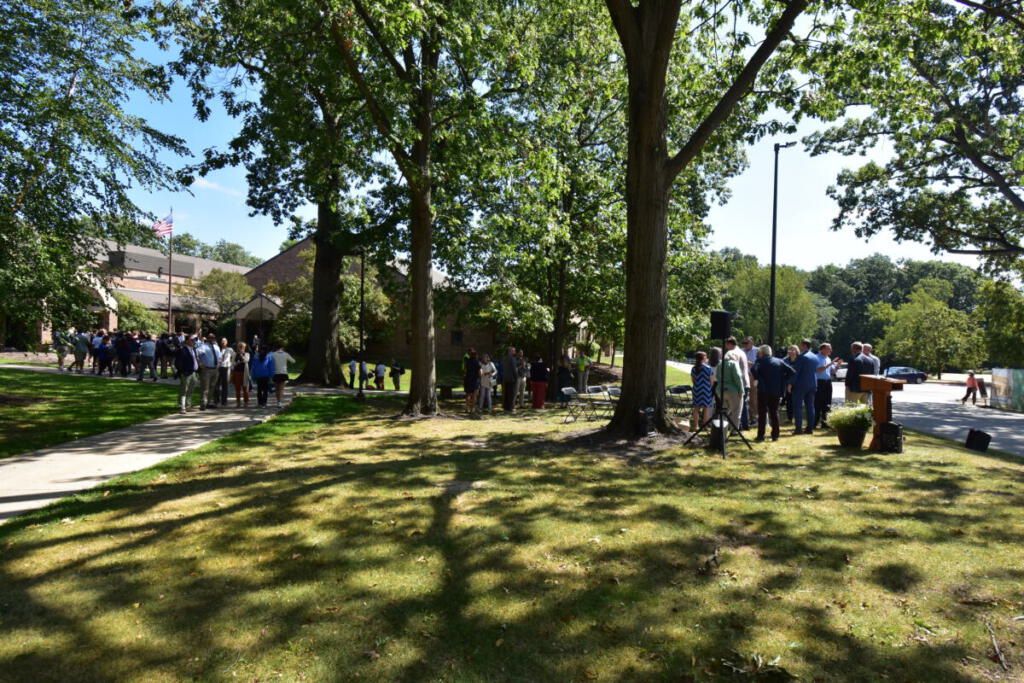 Students and faculty watching the ceremony
